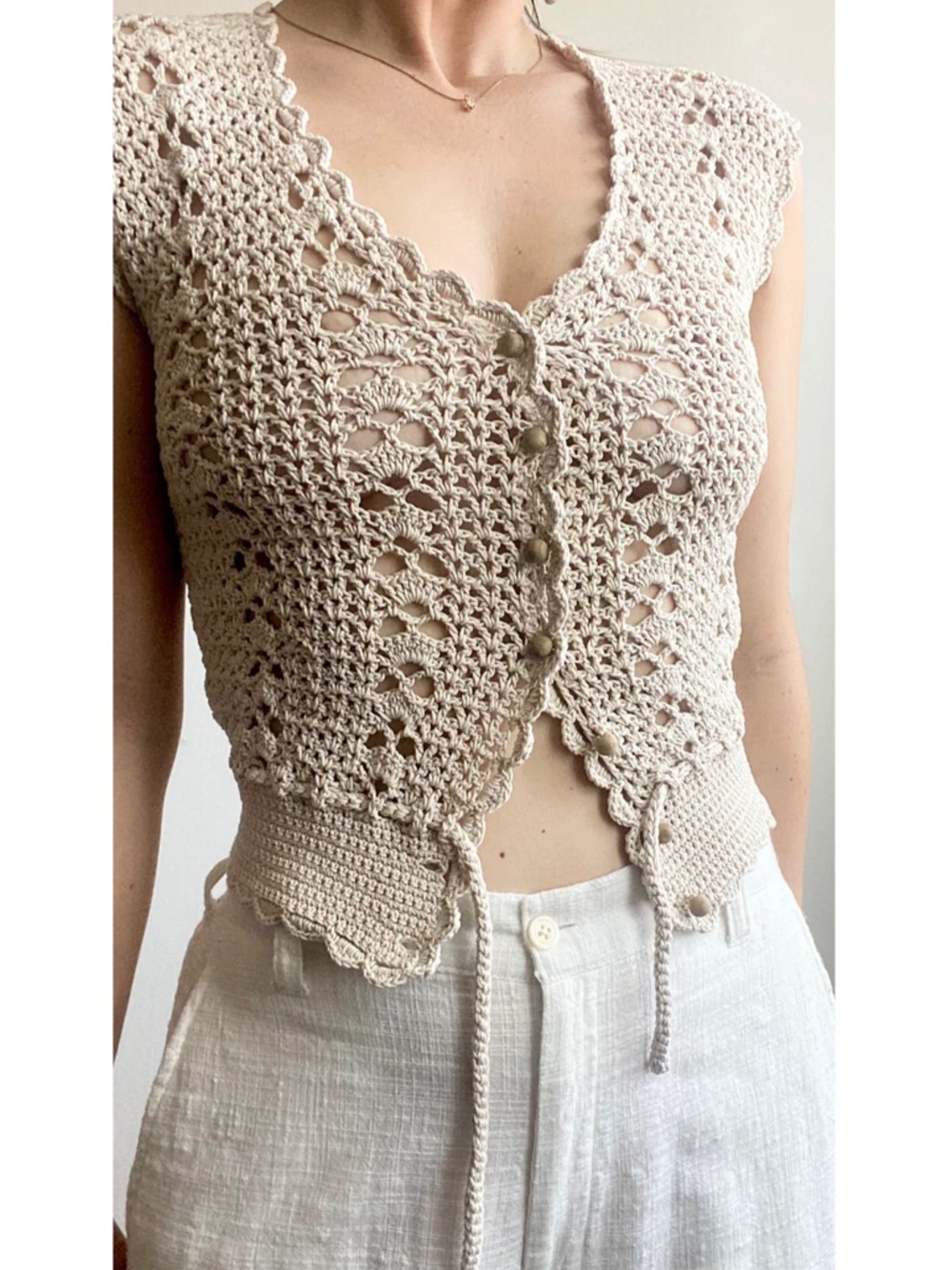Stunning Crochet top / vest with wood buttons and adjustable tie waist